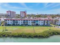 Beautiful condo complex with well-maintained lawn and water view, perfect for serene living at 250 Santa Maria St # 215, Venice, FL 34285