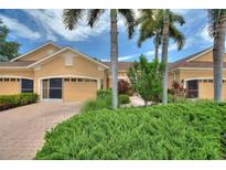 Charming single-Gathering home with well-maintained landscaping and a brick driveway at 4790 Turnberry Cir, North Port, FL 34288