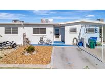 Charming single-story home with a well-maintained yard and a cozy, welcoming entrance at 15 Seaside Ct, Holmes Beach, FL 34217