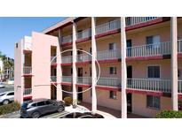 The condo has a private balcony and lovely white railings, providing a cozy outdoor retreat at 4133 Heron Way # E202, Bradenton, FL 34205
