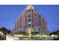 Stunning high-rise condominium featuring multiple stories, a clock tower, and private balconies at 1350 Main St # 1701, Sarasota, FL 34236
