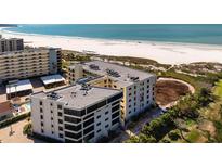 Coastal condominium complex on a beautiful white sandy beach with amazing ocean views at 5740 Midnight Pass Rd # 402, Sarasota, FL 34242