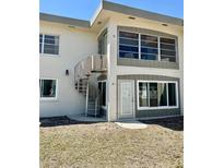 Bright condo with a spiral staircase leading to the second floor and lovely curb appeal at 6300 Flotilla Dr # 72, Holmes Beach, FL 34217