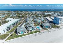 Beachfront condos offer stunning views of the ocean and a community pool for relaxing in the sun at 5400 Gulf Dr # 35, Holmes Beach, FL 34217