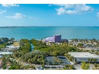 Stunning aerial view features a coastal city and ocean waters at 750 N Tamiami Trl # 519, Sarasota, FL 34236