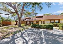 Charming single-story home with well-maintained landscaping and a private fenced-in side yard at 7523 4Th W Ave # 7523, Bradenton, FL 34209