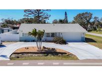 Charming single-story home with well-maintained landscaping and a spacious driveway at 4120 Shamrock Dr, Venice, FL 34293