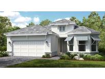 Charming single-story home showcasing a clean white exterior, gray roof, and a two-car garage at 14953 Contenta Loop, Bradenton, FL 34211