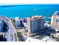 Stunning high-rise condominium offering panoramic views of the bay and vibrant city skyline at 35 Watergate Dr # 1103, Sarasota, FL 34236