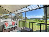 Cozy screened lanai with comfortable seating and lovely views of the water at 4234 Gulf Of Mexico Dr # Q2, Longboat Key, FL 34228