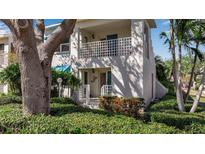 Charming two-story condo with landscaped front yard and balcony at 318 108Th St W # 318, Bradenton, FL 34209
