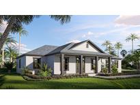 Charming single story home with front porch, grey roof, white siding, black trim, and landscaped front yard at 6137 Grove Blvd, Punta Gorda, FL 33982