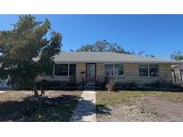 Charming single-story home with a well-maintained front yard and inviting entrance at 3808 118Th W St, Bradenton, FL 34210