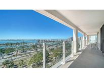 Breathtaking balcony view overlooking the water and city skyline, offering an ideal spot for relaxation and entertainment at 101 S Gulfstream Ave # 16K, Sarasota, FL 34236