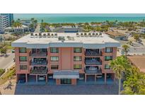 Charming condominium featuring multiple balconies with ocean views and covered parking at 131 Garfield Dr # 4D, Sarasota, FL 34236