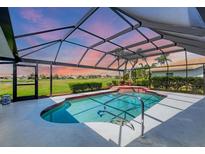 Relaxing screened-in pool area perfect for enjoying outdoor living and entertaining at 1511 Waterford Dr, Venice, FL 34292