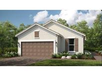 Charming single-story home with a two-car garage, neutral stucco, and well-manicured landscaping at 3169 Alba Cir, Bradenton, FL 34211