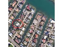 Aerial view of waterfront homes on canals, offering beautiful waterfront living at 537 Gunwale Ln, Longboat Key, FL 34228