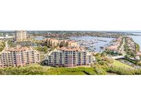 Luxury condos overlook a marina with an amazing view of the intercoastal and the Gulf of Mexico at 615 Riviera Dunes Way # 208, Palmetto, FL 34221