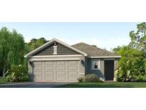 Charming single-Gathering home with a two-car garage and well-manicured front lawn at 10729 Hidden Banks Gln, Parrish, FL 34219