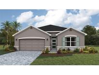 Charming single-Gathering home with a well-manicured lawn, paved driveway, and attached two-car garage at 17060 James Trl, Parrish, FL 34219