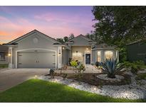Charming single-story home with a well-manicured lawn and a welcoming front entrance at 259 Golden Harbour Trl, Bradenton, FL 34212
