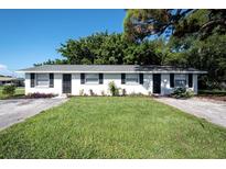 Charming duplex featuring a well-maintained lawn and landscaping, with updated windows and freshly painted exterior at 6434 5Th W St, Bradenton, FL 34207
