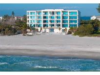 Beautiful beachfront condominium building boasting private balconies and expansive views of the Gulf at 4765 Gulf Of Mexico Dr # B202, Longboat Key, FL 34228