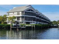 Waterfront condos with private boat docks, featuring three stories and screened lanais at 515 Leffingwell Ave # 209, Ellenton, FL 34222