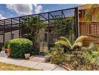 This landscaped patio area is fully screened and has a gate at 323 Bobby Jones Rd # 323, Sarasota, FL 34232