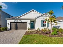 Charming single-Gathering home with a well-manicured front yard and a two-car garage at 16097 Old Fox Trl, Port Charlotte, FL 33953