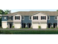 Charming townhomes feature a two-car garage and a thoughtfully designed exterior for curb appeal at 2465 Mellow Ln, Clearwater, FL 33765