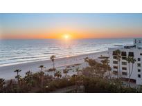 Breathtaking sunrise view over the pristine beach and ocean, a tropical paradise at 1281 Gulf Of Mexico Dr # 704, Longboat Key, FL 34228