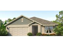 Charming single-Gathering home featuring a two-car garage, attractive landscaping, and a welcoming front porch at 4108 112Th E St, Palmetto, FL 34221