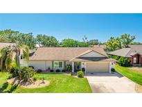 Charming one-story home features a manicured lawn, attached garage and beautiful landscaping at 914 82Nd Nw St, Bradenton, FL 34209