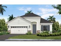 Charming one-story home featuring stone accents, a gray front door, and a lush landscaped yard at 11020 Hogan Cir, Englewood, FL 34223