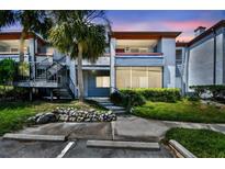 Charming condo with well-maintained landscaping, offering a delightful curb appeal and a welcoming entrance at 10265 Gandy N Blvd # 1004, St Petersburg, FL 33702