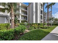 Condos feature lush landscaping, well-maintained grounds, and balconies at 1030 Tidewater Shores Loop # 404, Bradenton, FL 34208