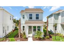 Charming two-story home featuring manicured landscaping, inviting entrance, and a welcoming facade at 172 Eagleston Ln, Sarasota, FL 34240