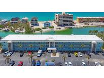 Gorgeous waterfront condominium with ample parking and beach access close to restaurants and other attractions at 9200 Midnight Pass Rd # 24, Sarasota, FL 34242