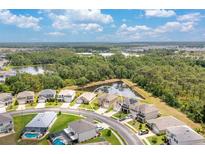 Aerial view showcases the home's location within a beautiful community with natural views at 259 Tierra Verde Way, Bradenton, FL 34212