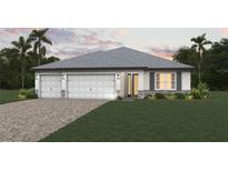 Charming single-story home featuring a three-car garage and well-manicured lawn at 27407 Deep Creek Blvd, Punta Gorda, FL 33983