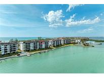 Waterfront condos featuring boat docks and gorgeous bay views at 8977 Midnight Pass Rd # 519, Sarasota, FL 34242