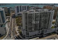 Stunning high-rise condo building with balconies overlooking water, city, and beach views from every unit at 301 Quay Commons # 1204, Sarasota, FL 34236