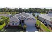 Charming single-story home boasts a well-maintained lawn and attached two-car garage at 6311 Sturbridge Ct, Sarasota, FL 34238