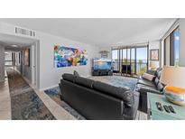 Spacious living room with view of a balcony at 707 S Gulfstream Ave # 501, Sarasota, FL 34236