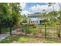 Charming two-story home with lush landscaping and mature trees at 2326 2Nd E Ave, Bradenton, FL 34208
