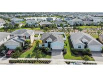 Charming single-story home with well-manicured landscaping and a paver driveway in a desirable community near a lake at 17549 Timberline Pkwy, Punta Gorda, FL 33982