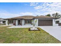 Beautifully renovated single Gathering home with updated landscaping and a two-car garage at 2881 48Th E Way, Bradenton, FL 34203