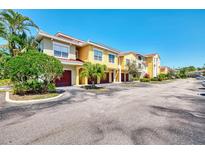 Lovely two-story townhomes with private garage parking and well-maintained landscaping at 5601 Bentgrass Dr # 10-105, Sarasota, FL 34235